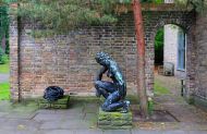 Installation View, Untitled, rubber, sandstone, variable dimenions, in the front: sculpture by Georg Kolbe