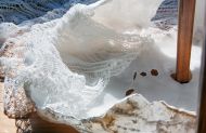 Apartment Neunzehn, Installation Detail, alabaster (22x40x30 cm) and doily, variable dimensions ©Verena Schmidt